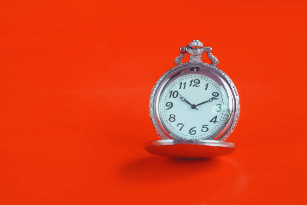istock Vintage pocket watch on color background. 1143729824