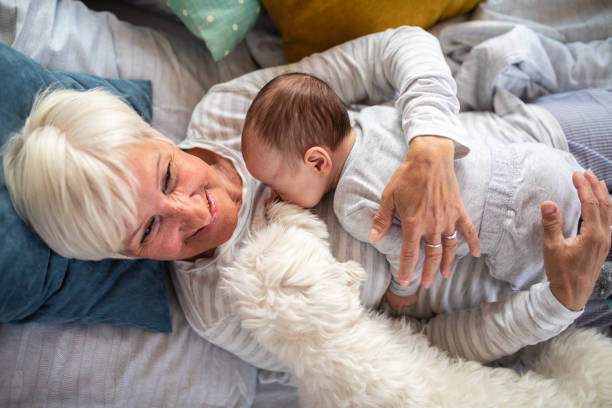 istock Grandma, grandson and fluffy dog 1143730696