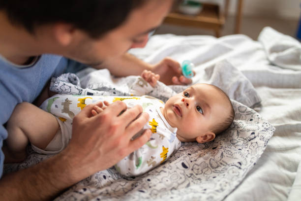 istock Baby making a grimace while dad talking to him 1143730790