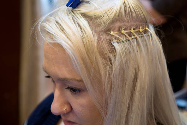 Hair extension being applied to make hair fuller. Image shot with Canon 5D Mark 4, 24-105mm f/4L IS USM lens.