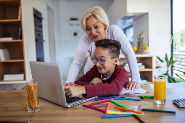istock Mom Helping Son With Homework 1143731102