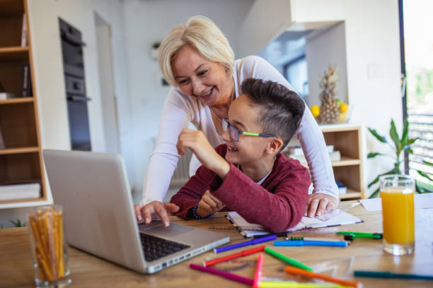 istock Mom Helping Son With Homework 1143731126