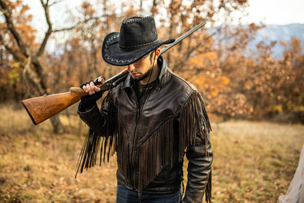 Brave Cowboy With Rifle On His Shoulder 