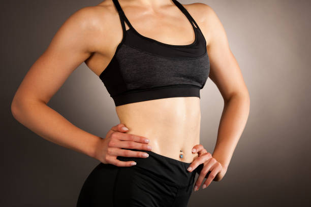 istock Active young fit woman with perfect body pose 1143734685