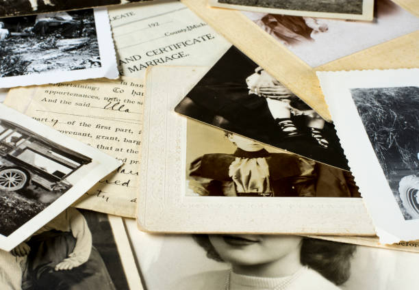 Old Genealogy Family History Photographs and Documents 5 Genealogy family history theme with old family photos and documents. origins photos stock pictures, royalty-free photos & images