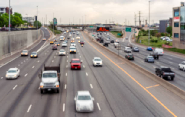 Toronto, Ontario, Canada - June 26, 2013: Traffic on Toronto Don Valley Parkway (DVP) highway in the evening with CAA tow truck on the right.