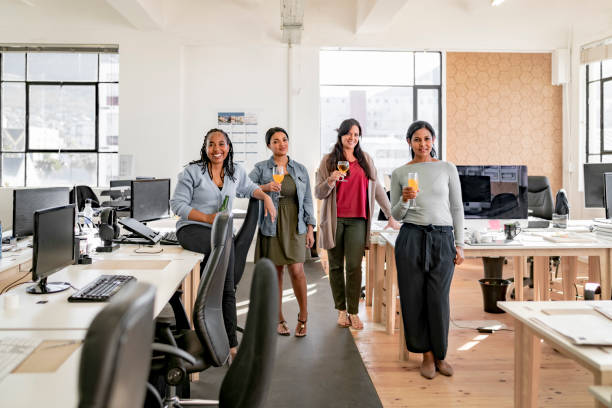 istock Confident businesswomen celebrating at office. 1143735624