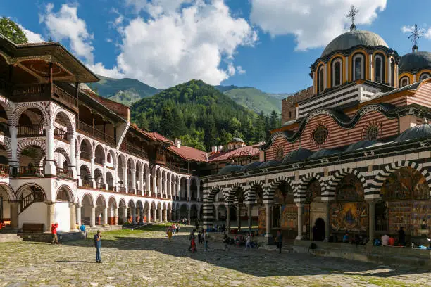 Photo of The Orthodox Rila Monastery, a famous tourist attraction and cultural heritage monument in the Rila Nature Park mountains in Bulgaria