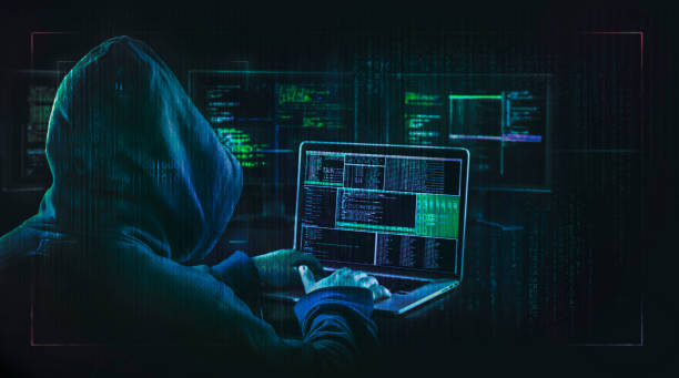 темная паутина с капюшоном хакера - cyber crime стоковые фото и изображения