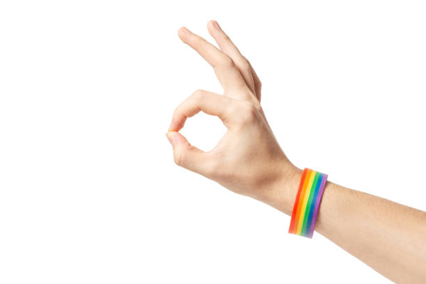 istock Isolated hand gesture with rainbow gay pride bracelet 1143737629