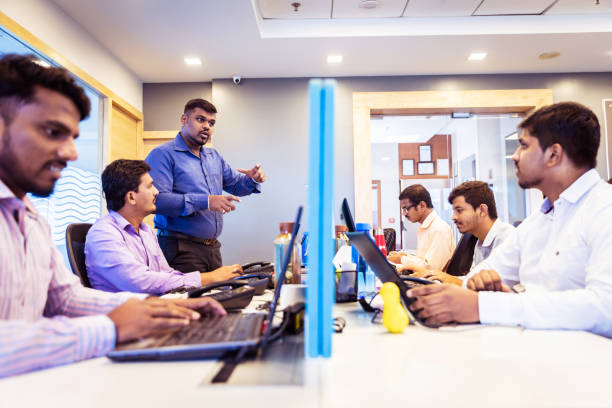 istock Casual Banter around Office Cubical 1143740527