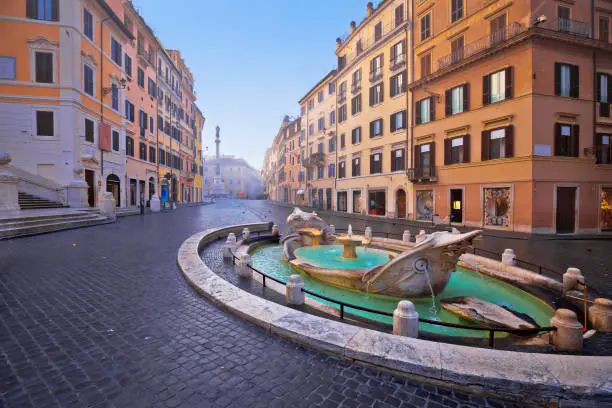 Photo of Piazza di Spagna square and Fontana della Barcaccia fountain in Rome morning view