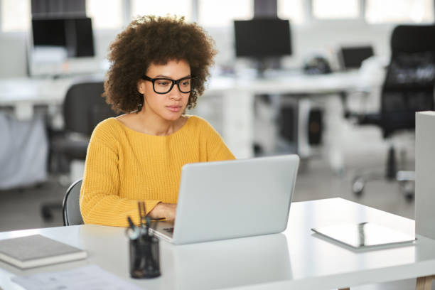 istock Serious businesswoman using laptop. 1143744652
