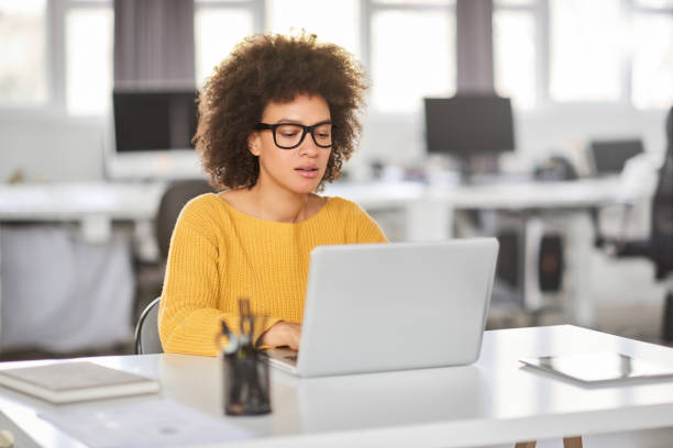 istock Serious businesswoman using laptop. 1143744789