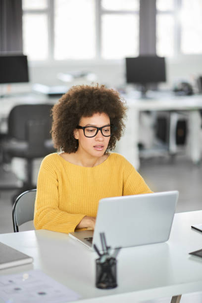 istock Serious businesswoman using laptop. 1143744920