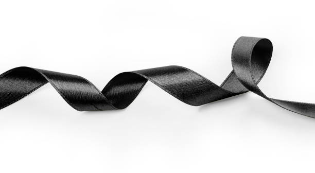 istock close up of black ribbon on white background 1143745027