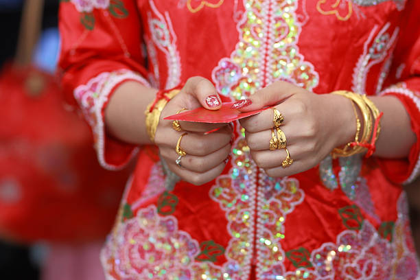 Diamond Wedding rings and chinese Red envelope stock photo