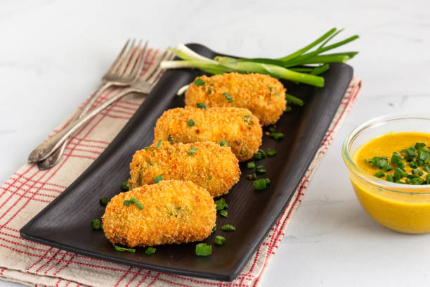 istock Potato Croquettes with Cheese Served with Mustard Sauce 1143748075