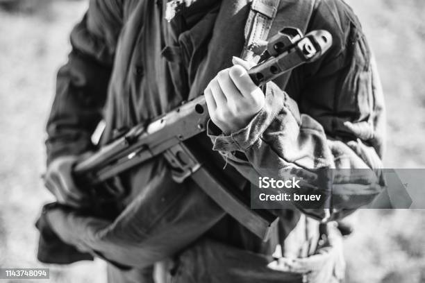 Woman Reenactor Dressed As World War Ii Soviet Russian Red Army Soldier Holding World War Ii Weapon Submachine Gun Pps43 Wwii Ww2 Russian Ammunition Photo In Black And White Colors Stock Photo - Download Image Now