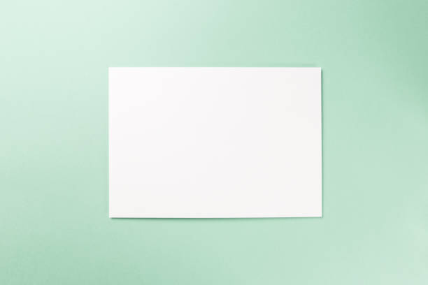 istock Blank notebook on Mint background. Top view. Flat lay. Copy space. Colorful background. Neo Mint color of the year 2020 1143751181