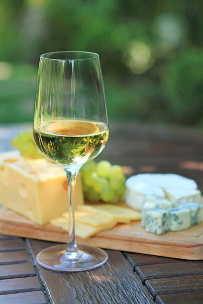 istock Various sorts of cheese, grapes and white wine 114375201