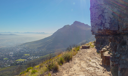 View of Cape Town City from a hiking trail on Table Mountain with Devil's Peak, Cape Town, South Africa