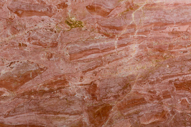 istock Red marble background close up, detail texture. 1143754286