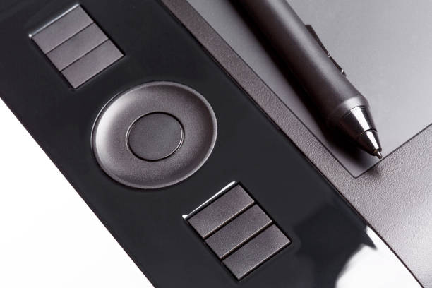 Professional graphic tablet with pen, stylus close-up. Isolated.