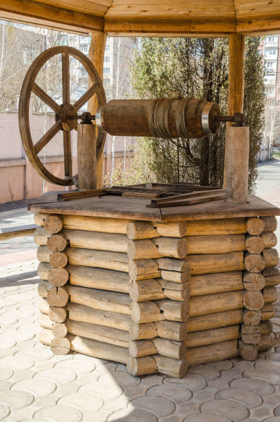 istock wooden arbour with a well 1143761970