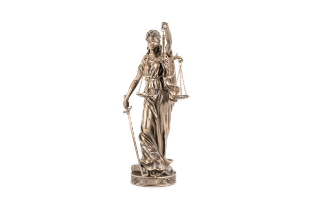 bronze statuette of Themis on white