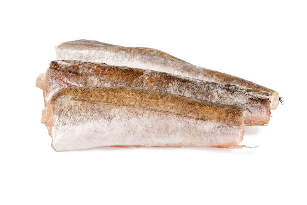 pesce nasello congelato su bianco - catch of fish healthy eating hake food foto e immagini stock