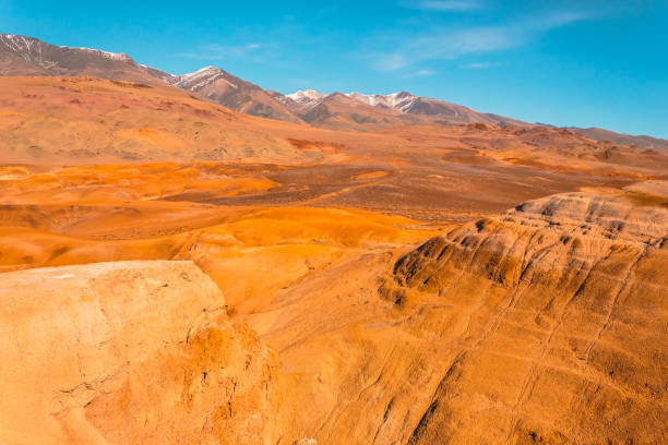istock Yellow and red rocks under blue sky. Desert landscape with mountains. 1143771002