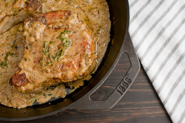 istock Pork Chops with Peppercorn Sauce 1143771053
