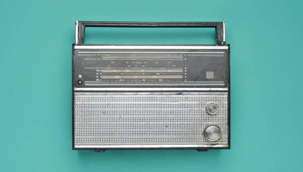 istock Obsolete retro radio receiver on a blue pastel background. Top view. 1143777450