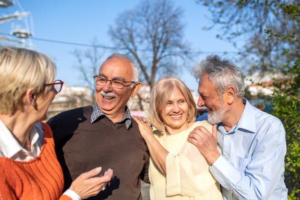 istock Group of smiling senior friends. 1143777545