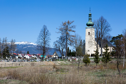The Slovakian countryside during a warm, spring day.  One of several village churches.  Rabka is located on the northeastern part of Slovakia.