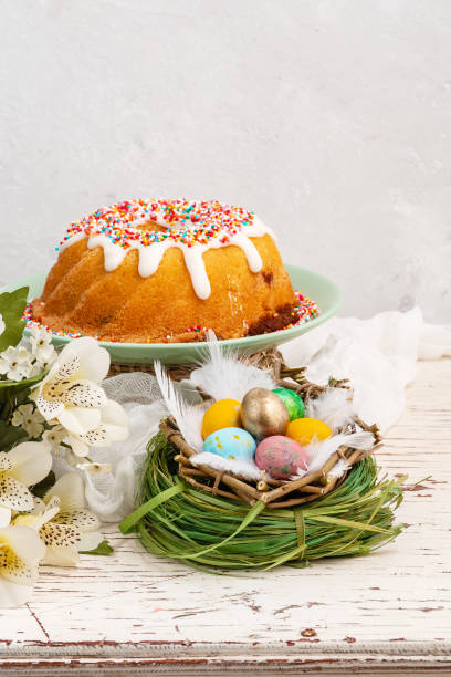istock holiday cupcake, colored eggs in a nest, Easter Christian traditional holiday 1143785497