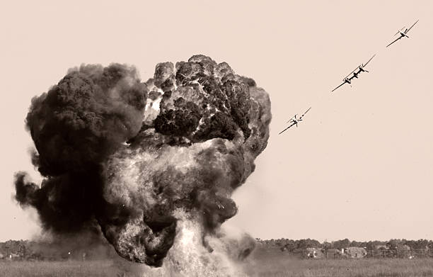 Black and white explosion from aerial assault stock photo