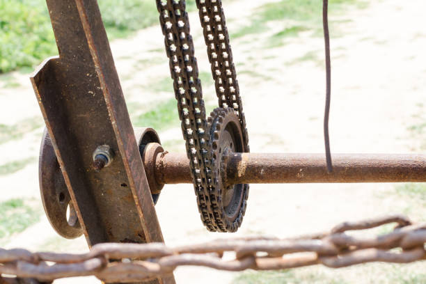 istock Old rusty sea winch on the shore 1143787856