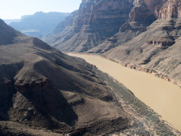 colorado river in the grand canyon seen from a helicopter - canyon majestic grand canyon helicopter imagens e fotografias de stock