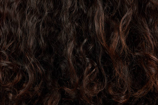 istock Dark curly hair closeup 1143790869