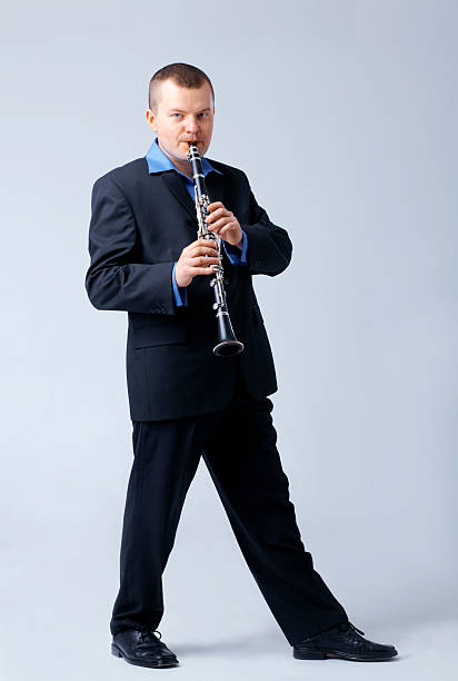 istock Flutist is Playing on Flute. 114379395