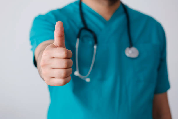 Doctor hand giving thumbs up