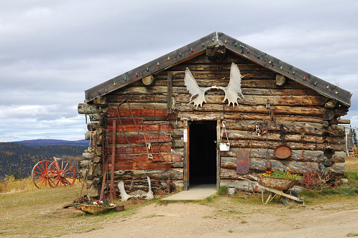 One of the oldest roadhouses of Alaska is located in Boundary.It is decorated with anlers and nostalgic objects, USA.