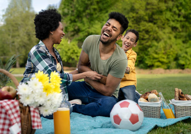 istock Happy family spending a spring day on picnic 1143802524