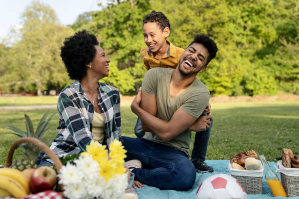istock Happy family spending a spring day on picnic 1143802642