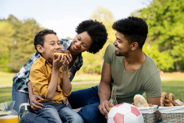 istock Happy family spending a spring day on picnic 1143802658