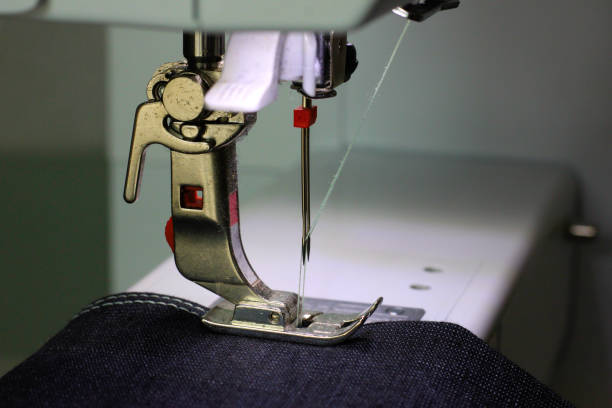 istock Pressing foot of a sewing machine with double needle. 1143803802