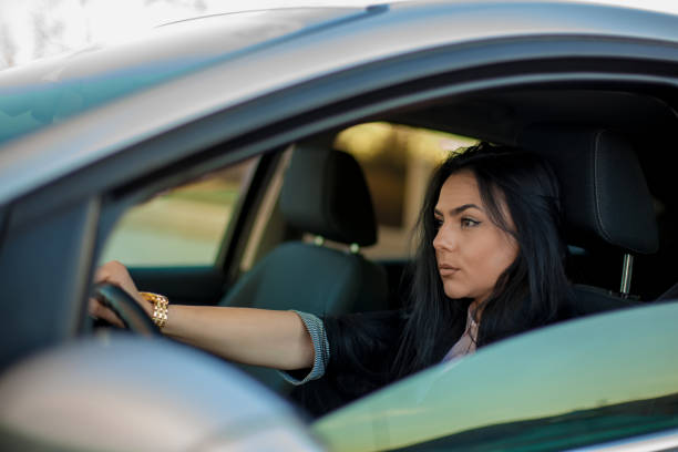 istock Woman behind the wheel 1143804423