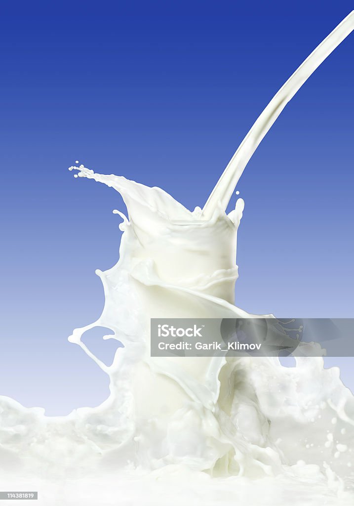 milk splash  Blue Stock Photo